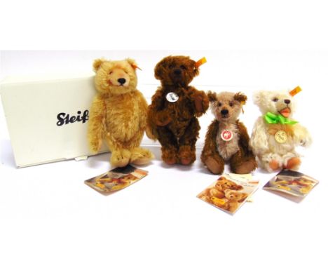 FOUR STEIFF COLLECTOR'S TEDDY BEARS  comprising 'Dicky', gold, 18cm high, boxed; 'Jona', brown, 18cm high, unboxed; 'Classic 