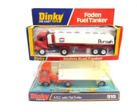 TWO DINKY MODEL LORRIES  comprising a No.915, A.E.C. With Flat railer 'Truck Hire Co. / Liverpool', with an orange tractor un