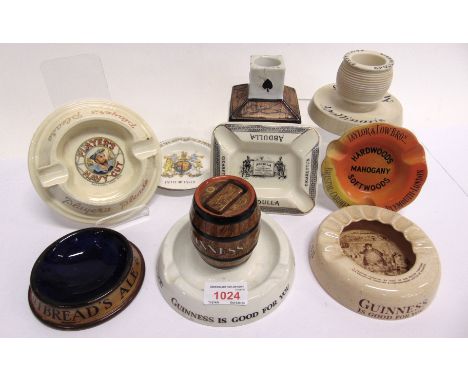 ADVERTISING - SEVEN CERAMIC ASHTRAYS  comprising one Guinness, by Mintons, with integral barrel-shaped matchbox holder; one G