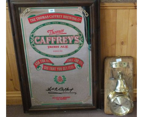 A ships clock and bell plus a reproduction Caffreys wall mirror