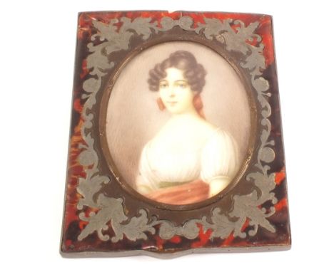 A 19th Century miniature half length portrait of a lady in a tortoiseshell frame
