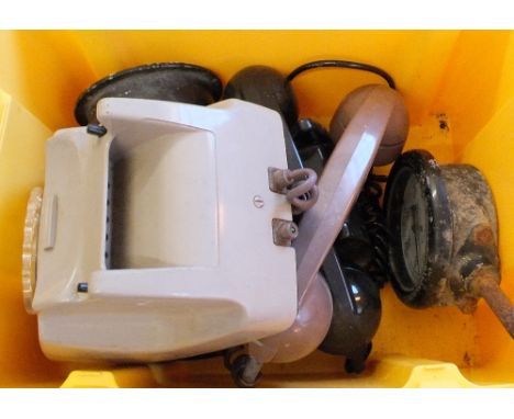 Black and grey telephones, an industrial thermometer and pressure gauges