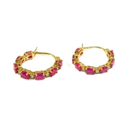 A pair of 9ct Gold Ruby and Diamond hoop earrings