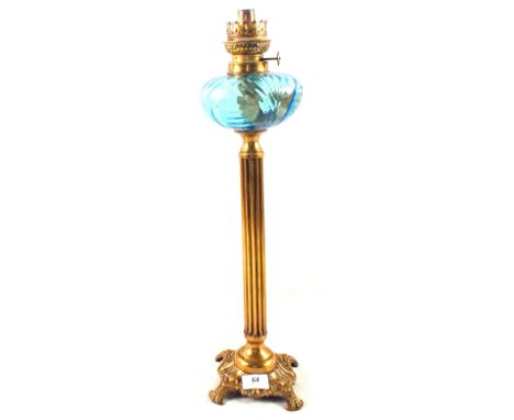 A Brass column oil lamp with blue glass bowl