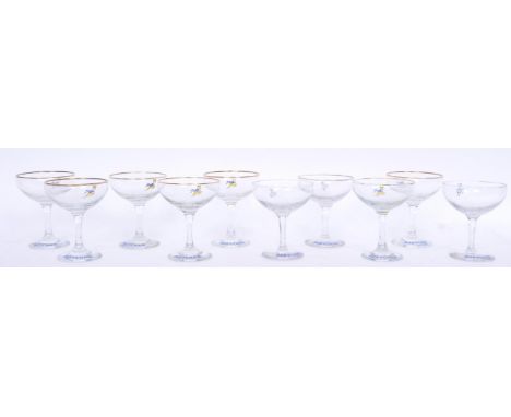 A collection of twelve vintage retro 20th century Babycham coupe glasses all having gilt rims with deer figure to the glass a