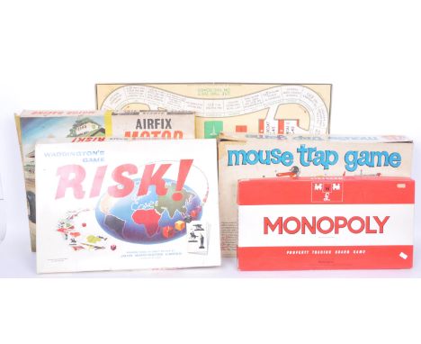 A collection of vintage games from the early 20th century to include: The Lucky Seven domino game, Speech Day puzzle and toge