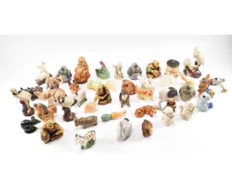 A large collection of Chinese -Asiatic whimsies of animals to include ceramic pottery and soapstone. Figurines to include a s