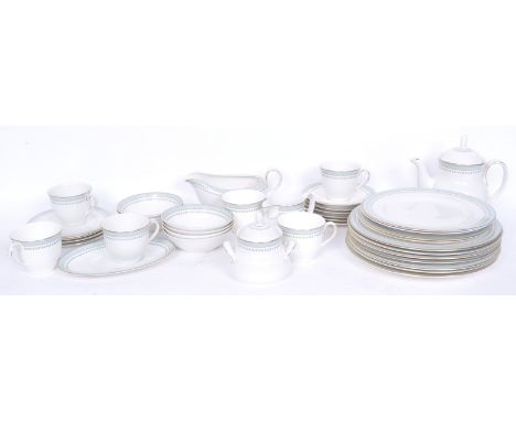 A collection of vintage 20th century Royal Doulton Berkshire porcelain china dinner service having a repeating palmette motif