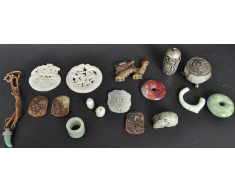 A collection of Chinese Jade, Nephrite and soapstone items to include Bi's, lidded locust pot, toggle, donuts, Qulin, jade ti