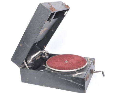 A vintage mid 20th century Columbia Grafonia N1092 gramophone having a hard wood case with carry handle to the top. Comes wit