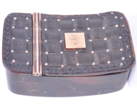 A 19th Century Victorian snuff box of rectangular form having carved cross banded decoration to the lid with carved shell mot