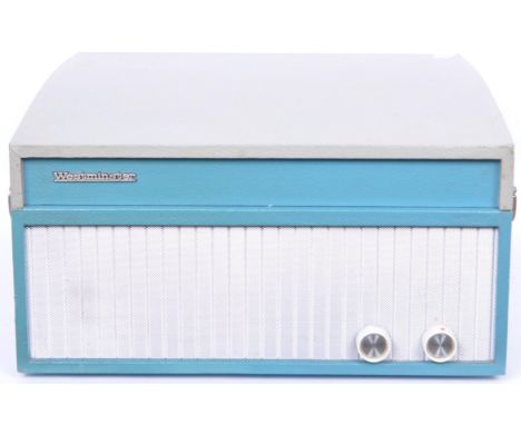 A vintage mid 20th century Westminster Monarch record player in a portable carry case. Measures 20cm x 38cm x 41cm.&nbsp;