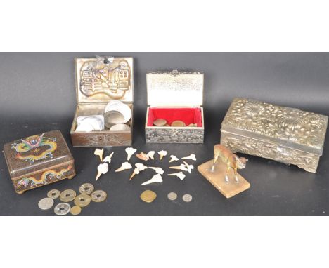 A collection of Chinese sharks teeth together with a metal painted ox, enamel dragon pill box, three white metal Chinese cask