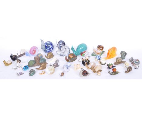 A large quantity of vintage 20th century Snail related ornaments. The collection includes Cloisonne, Herend style, Zolnay Pec