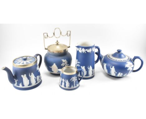 An assortment of vintage 20th century Wedgwood Jasperware tea service pieces / tablewares to include a coffee pot, a teapot, 