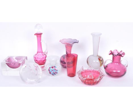 A collection of Victorian to mid 20th century cranberry glass item to include a Caithness style tutti frutti stem vase, a Mur