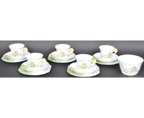 A 1930's Art Deco Melba Bone China fine grade porcelain tea service. Each with country cottage scenes having flower head hand