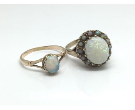 Two 9ct gold an opal rings, approximate ring size R, total weight of both rings approximately 6.9 grams.