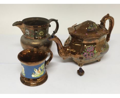 Three items of copper lustre ware items comprising a teapot, jug and tankard.