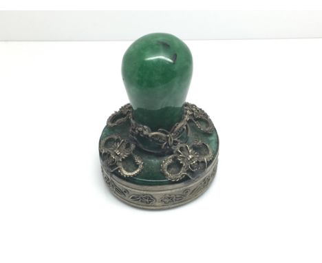 A Chinese jade type and metal mounted seal.