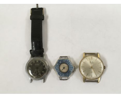A silver and enamel watch face, another by Mudo and a gent's Pierce waterproof a watch