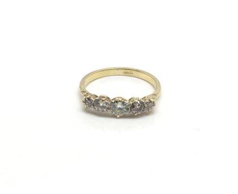 A 1920s ladies 18ct yellow gold ring inset with five graduating diamonds, total weight approximately 2.2 grams, ring size app