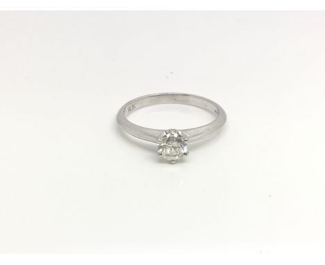 An 18ct white gold ring inset with a .55ct diamond, total weight approximately 3.5?grams, ring size approximately N.