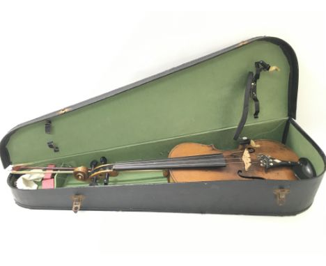 A cased violin with horsehair bow, the violin being a copy of Antonius Stradivarius.