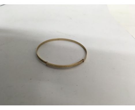A 9ct gold bangle. Weight approx 3.1g