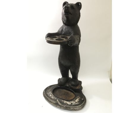 A Black Forest stick stand in the form of a standing bear, approx 97.5cm.