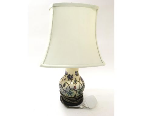 A Moorcroft 'Hepatica' pattern lamp and shade