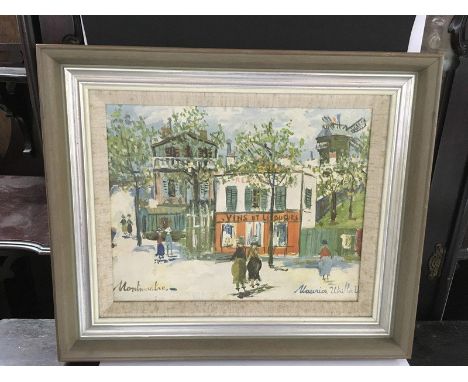 A Maurice Utrillo print depicting a French street scene, gallery labels to reverse..Approximately 41x48cm