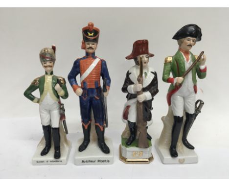 A collection of 12 ceramic military figures.