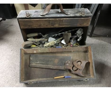 A carpentry box contains a small collection of tools and oddments together with a collection of grinding disks