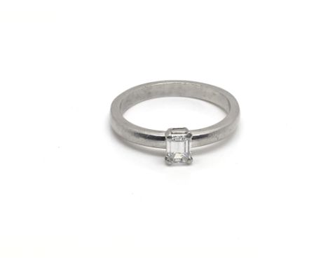 A ladies platinum ring inset with a radiant cut baguette diamond, total weight approximately 4.5 grams, ring size approximate