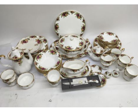 A Royal Albert Country Rose tea/dinner service.