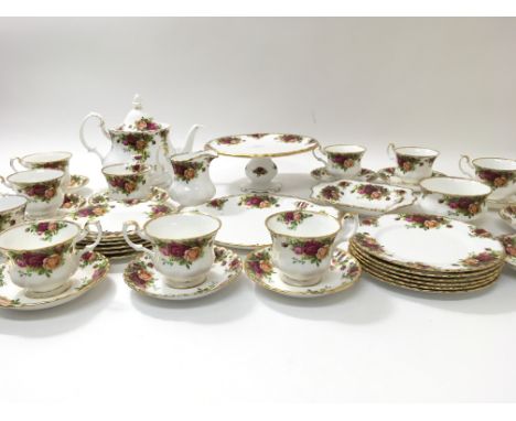 A fine quality Royal Albert Old Country Rose tea set to serve twelve people including teapot, cake stand, cream jug, sugar bo