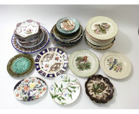 A collection of decorative wall plates to include a collection of Royal Worcester Paisley plates decorated with birds and oth