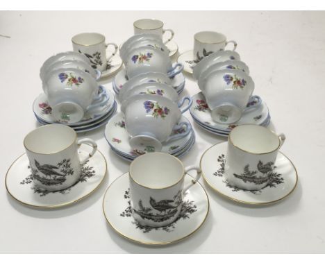 A Royal Worcester coffee set and a Shelley tea service with floral spray decoration.