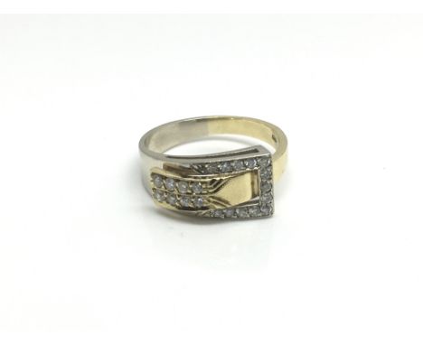 An 18ct yellow gold buckle ring inset with diamonds, total weight approximately 4.3 grams, ring size approximately M.