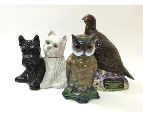 A Famous Grouse whisky bottle in the form of a grouse, a scotch whisky bottle in the form of two dogs and a ceramic owl (3).