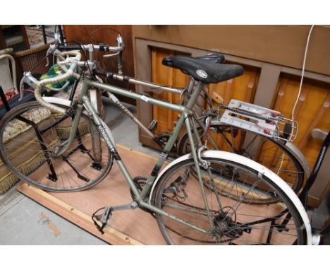 Two vintage road racing cycle bikes incluidng a Raleigh and Smalleys viscount