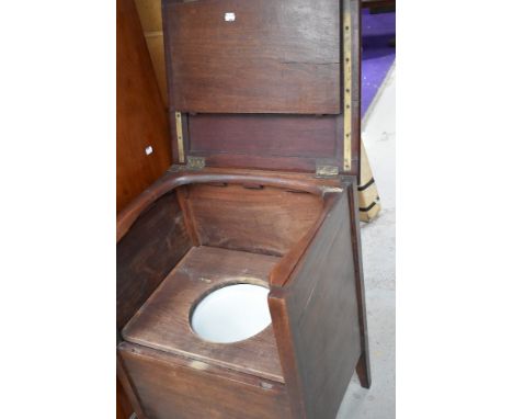 A 19th Century mahogany commode, of box form, some damage and old repair to arm rest