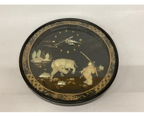 A VINTAGE MOTHER OF PEARL ORIENTAL CLOCK 