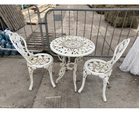 A VINTAGE STYLE METAL BISTRO SET COMPRISING OF A ROUND TABLE AND TWO CHAIRS 