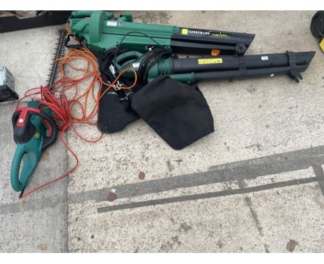THREE ELECTRICAL GARDEN TOOLS TO INCLUDE TWO LEAF BLOWERS AND A BOSCH HEDGE TRIMMER 