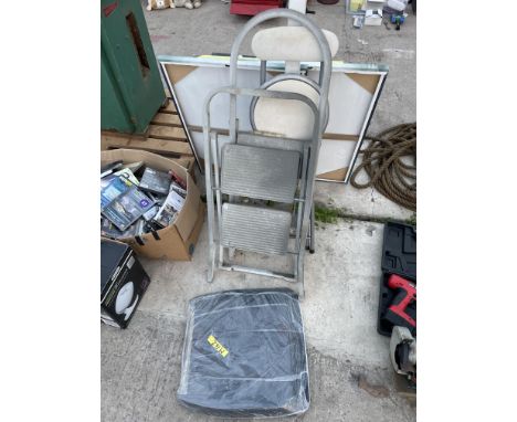 A STOOL, TWO STEP LADDERS AND A TV STAND 