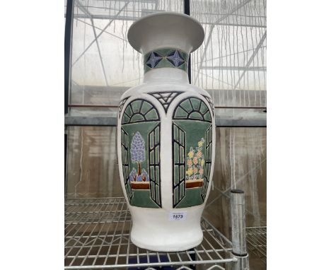 A LARGE CERAMIC STICK STAND/VASE WITH FLIOWER DECORATION 