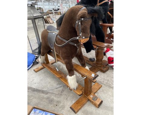 A VINTAGE MJMARK BROWN AND WHITE ROCKING HORSE 