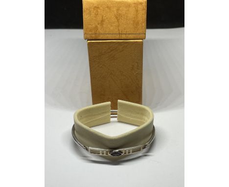 A SILVER MACINTOSH BANGLE, BOXED 